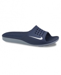 Treat your feet to the most comfortable slides they'll ever wear. These Nike men's sandals promise to deliver with advanced Solarsoft foam technology.