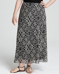 Lend elegant movement to your daily look with this tribal-print DKNYC Plus maxi skirt. Play up the global sentiment with layered necklaces and stacked bangles.
