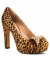Edgy doesn't begin to describe these glam pumps. Vince Camuto's Jamma 2 platform pumps feature a bold animal print with a totally studded out bow on the vamp.
