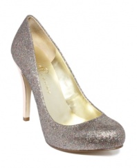 It's your time to shine in the Ivanka Trump Pinki Pumps with their glittering upper, sexy low-cut vamp and mirror-finish metallic heel.