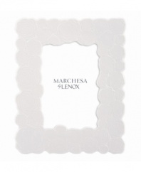 Cherish memories with the fresh and chic Marchesa Rose picture frame. White bone china sculpted with blooms inspired by the designer's couture gowns infuse a room with modern romance. From Marchesa by Lenox.