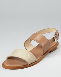 A masterful mix--these MICHAEL Michael Kors sandals combine luxe leather and natural canvas for a flawless result that's perfect for summer.