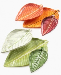 Nesting Leaf trays serve great purpose in your home and for the artist, Moro of Jacmel. Orange and red leaves made of recycled paper to resemble the Caribbean nation's autumn foliage are ideal for serving dry goods and organizing trinkets on a console or coffee table.