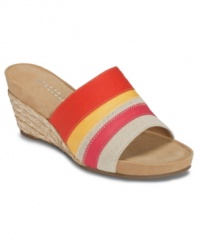 Something cheery to welcome the warmer weather! A one-band design in striped canvas and a raffia-covered heel give this sandal a fun-in-the-sun feel, while a suede footbed soothes the sole.