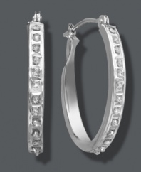 It's your time to shine. Stunning oval-shaped hoop earrings get an extra glamorous touch with the addition of sparkling diamond accents. Crafted in 14k white gold. Approximate diameter: 3/4 inch x 1/2 inch.