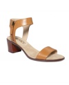 Break out the sunscreen with the Gabriella sandals by Ellen Tracy. Simple straps at the toe and ankle keep you in step, while the mid-height heel adds a touch of lift to your already chic look.
