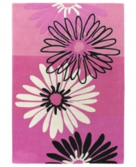 Fun and full of personality, this lively rug displays a mix of flowers against a cascading purple backdrop. Soft, yet durable poly-acrylic construction makes it a smart, sophisticated choice for any girl's room.