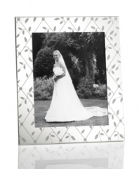 Detailed with diamond latticework, the silver-plated Petal Trellis picture frame lends everlasting romance to modern homes and special moments. A gift any couple will cherish. From Martha Stewart Collection.
