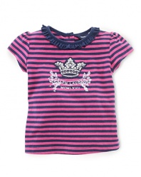 A whimsical flower patch and bold stripes give a sweet charm to a comfortable cotton jersey tee.