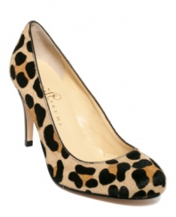 The Ivanka Trump Amoros Pumps reinvent the classic career high heel for a new generation with a sleek leopard print upper and stacked stiletto.