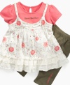 Add a little whimsy to her wardrobe with this adorable, ruffly flower-print tunic and leggings set from Calvin Klein.