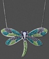 Fantasy in flight. Kaleidoscope's whimsical dragonfly pendant shines in tanzanite, peridot, and indicolite tone crystals with Swarovski Elements. Set in sterling silver. Approximate length: 18 inches. Approximate drop: 1-1/4 inches.
