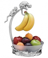 Don't monkey around, keep produce in prime condition with this combination fruit bowl and banana holder from Arthur Court's collection of serveware and serving dishes. A curious family and ring of leaves made of sand-cast aluminum accent the kitchen counter or table with fresh whimsy. With frosted glass bowl.