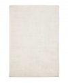 Presenting solid, classic white in soft viscose, the Beckett area rug from Lauren Ralph Lauren offers a chic ground ripe for enhancing any modern setting. Durable enough to withstand heavy indoor traffic, yet luxuriously soft underfoot.
