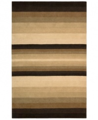 With a modern approach to traditional designs, the India House collection offers beauty to be appreciated for years to come. Meticulous hand-tufting results in truly artful detail. Tonal styling in rich browns and tans gives this rug striking geometric appeal.