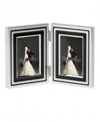Add new elegance to beautiful memories with Vera Wang's With Love Noir folding picture frame. Geometric detail lends metallic shimmer to chic black enamel in a home accent that invokes modern and deco design.