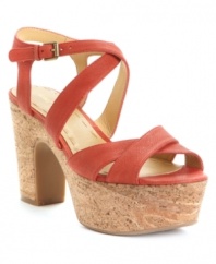Keep people guessing with the natural cork platform of the Guessagain sandal by Nine West. The chunky heel gives lift to the rich leather straps. (Clearance)