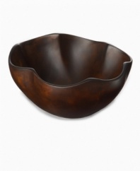 With a gently scalloped shape handcrafted in sustainable, farm-raised obeche wood, the Selena scalloped bowl made by Einstein Albert for Heart of Haiti's collection of serveware and serving dishes is truly one of a kind. A rich stained finish highlights the organic beauty of a serving piece that's inspired by the moon goddess but entirely down to earth.