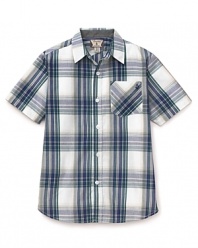A cool, crisp summer look, the short sleeve button-down shirt is rendered in a large plaid, with topstitch accents and a patch pocket at the chest.