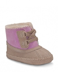 At the crossroads of the boot and bootie, this cute boot gets it right with soft 2-tone sheepskin upper and cozy plush lining.