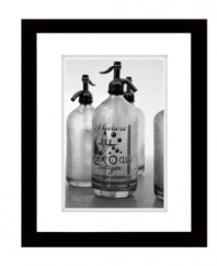 Fitting for the kitchen or bar, this retro-cool wall art depicts vintage seltzer bottles in black and white. Matted and framed in black wood for sophisticated polish from Lauren by Ralph Lauren.