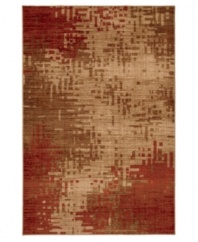 An artful arrangement of red tones gives this Mohawk area rug an almost pixelated quality, adding a point of interest to any floor. Woven from durable olefin yarn that ensures a thick pile and super-soft hand.