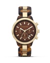 Tap this season's tortoise shell trend with this watch from MICHAEL Michael Kors. It's tonal face and bold bracelet perfect jet set chic, so wear it to give looks first class attitude.