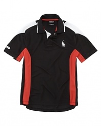 Rendered in soft-touch microfiber mesh, this ultra-breathable polo shirt features a bold color-block pattern for a stylish, athletic look.