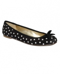 On the dot. Arrive on time and on trend in the adorable Erwyn2 ballet flats by GUESS. In a cute polka dot fabric, they lend a funky edge to your look.