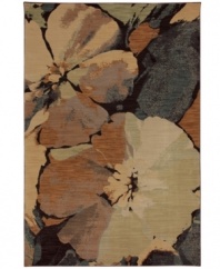 Perennial favorite. Blooming with a bold floral motif, this striking area rug makes a dramatic impact wherever it's placed. Thick and resilient underfoot, this plush piece is woven from 2-ply nylon pile, ensuring easy care and long-lasting wear.