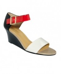 Make way for mod fashion. The Packurbag wedge sandals by Nine West are ready to go with their on-trend colorblock design.