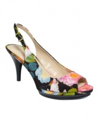 Treat yourself to flowers. With a beautiful floral upper, the Sharina slingback pumps by Nine West will lighten your step during a day at the office or a weekend lunch with friends.